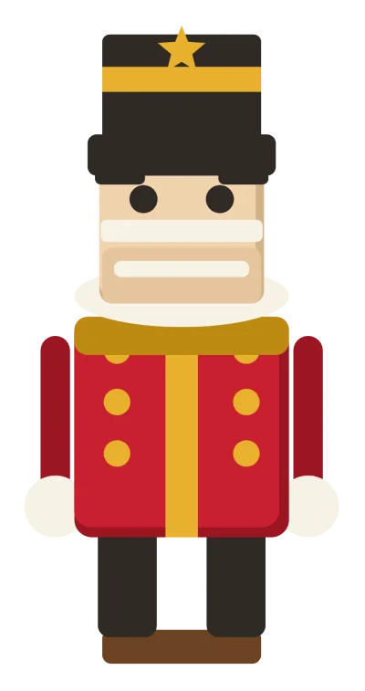 A toy nutcracker soldier in a red coat and tall black hat, with a white beard and a lever at the back.