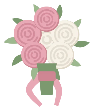 A round bridal bouquet of white and blush roses with green foliage and trailing ribbons.