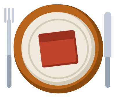 A dinner place setting with a plate on a charger, a fork, a knife and a folded napkin.