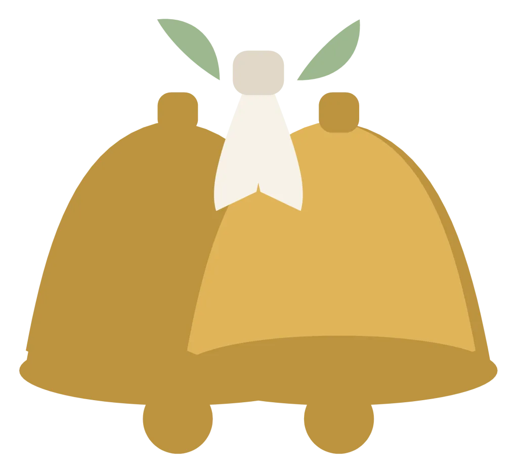 Two gold wedding bells tied with a white ribbon bow and a sprig of foliage.