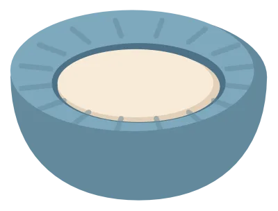 A round blue cat bed with a raised padded rim and a cream cushion in the middle.