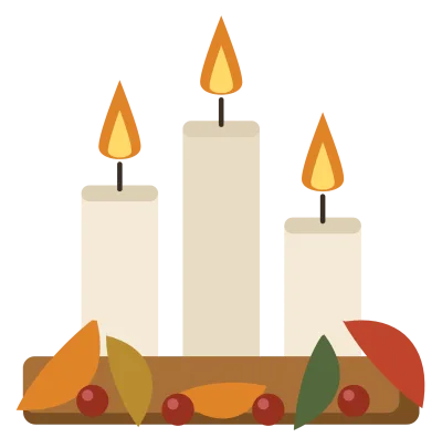 Three lit candles of different heights on a wooden base with leaves and berries around them.